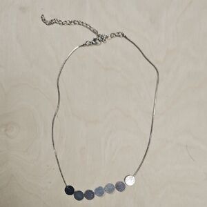 Elegant Silver Necklace with Disc Accents